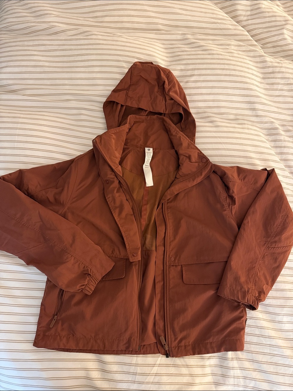 Lululemon Rust Brown Hooded rain jacket size 4.